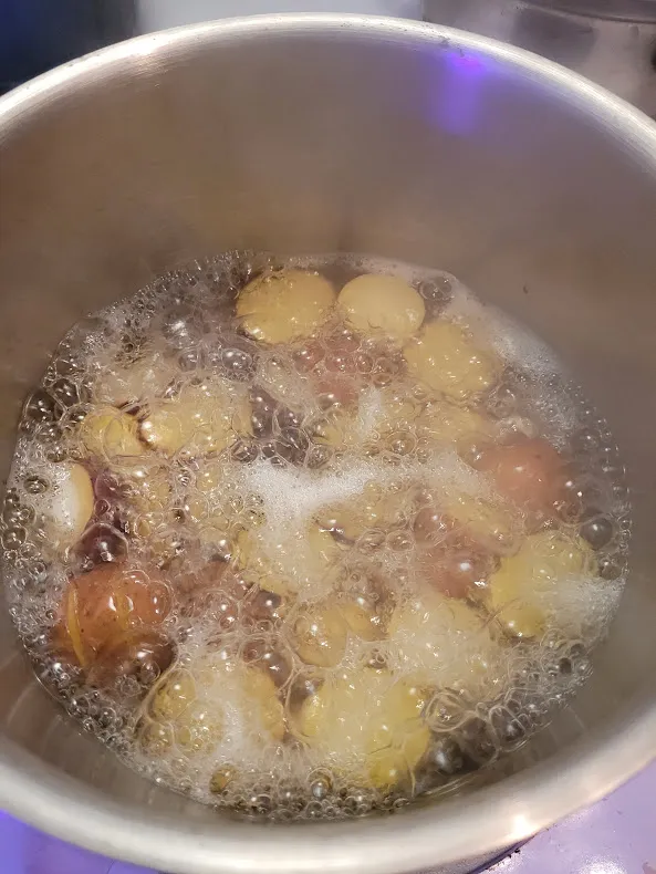 Boiling potatoes for wfpb vegan gluten and wheat free cheese pierogies