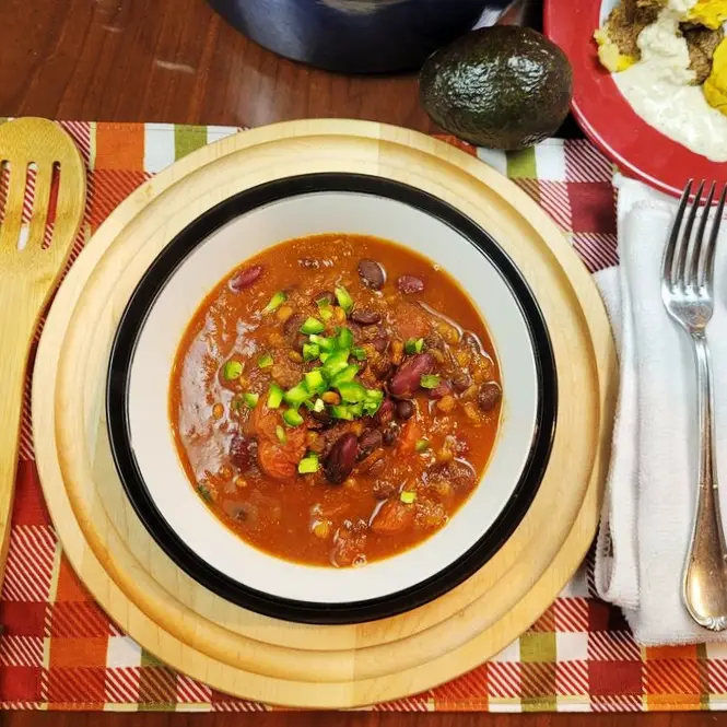 WFPB Lentil Chili in a bowl ready to eat warm in a bowl